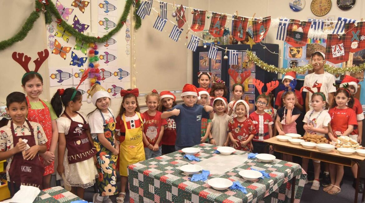 Greek Saturday School students bake Christmas sweets and sing carols in Greek